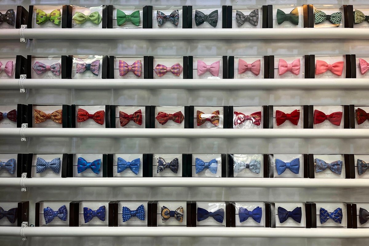 a display of many different colored bow ties